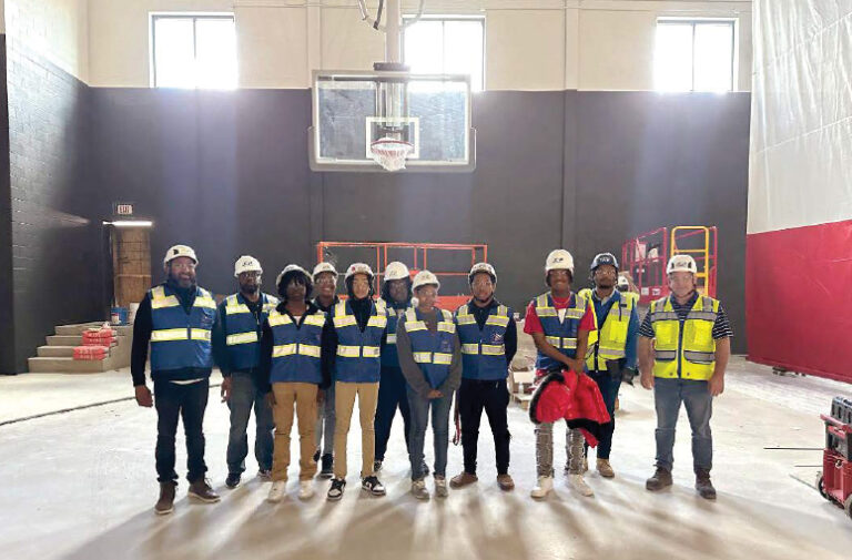 JCP employees smiling together at a jobsite