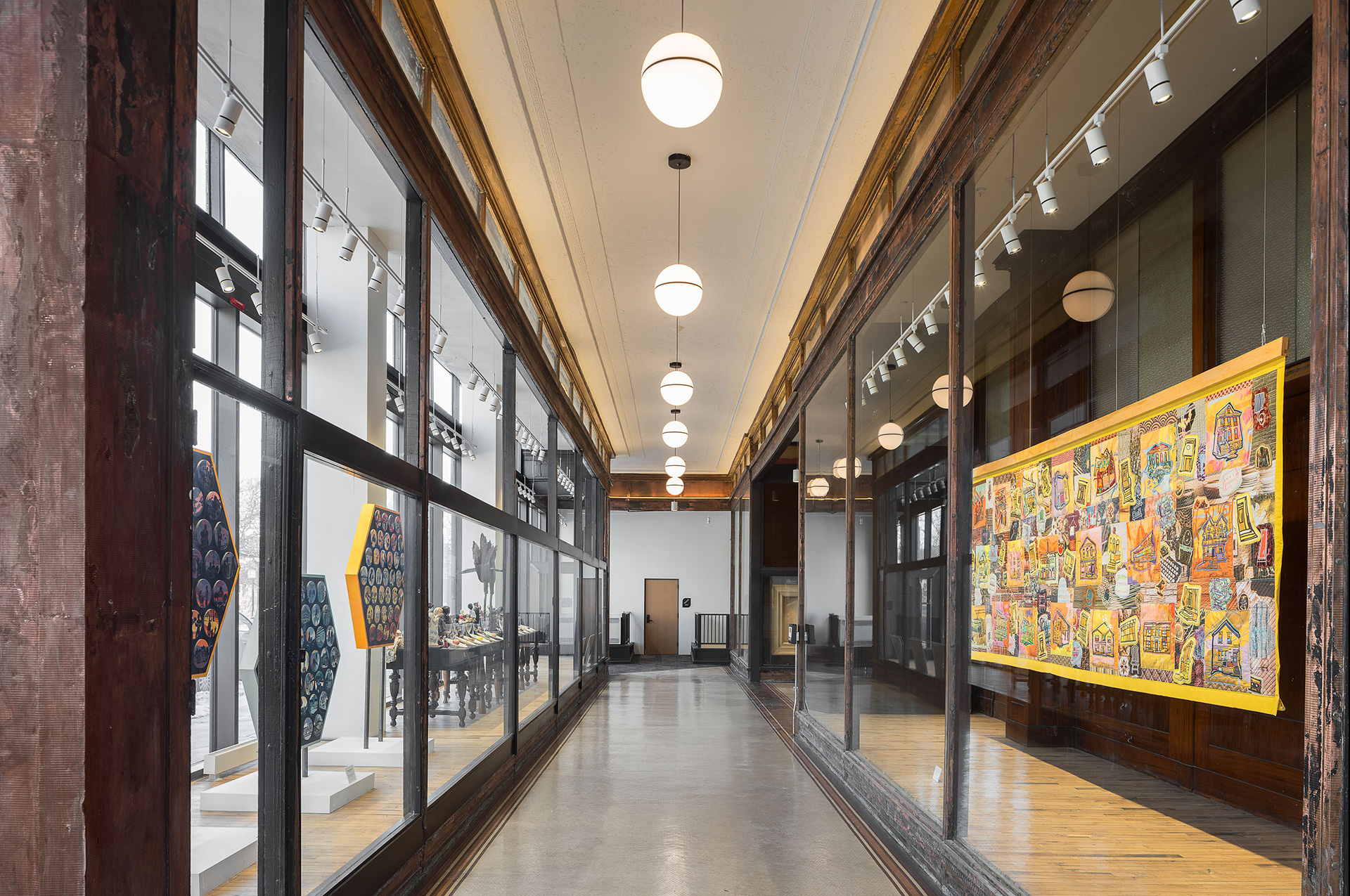 Thrive on King hallway with art